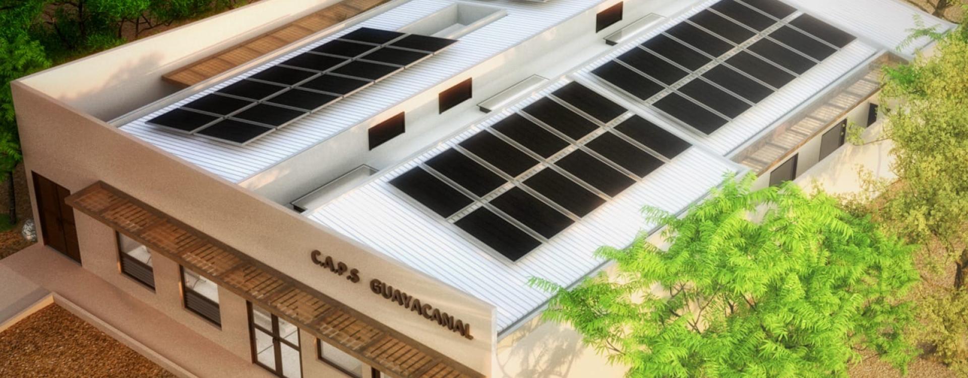 Edificio de una sola planta con paneles solares en el techo.