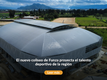Vista del coliseo con diseño futurista en metal en construcción.